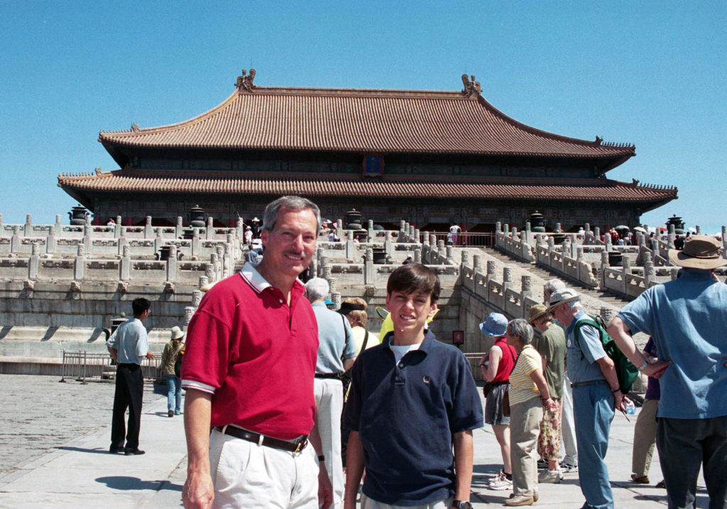 Chip & Lee standing in front of an ancient Chinese building