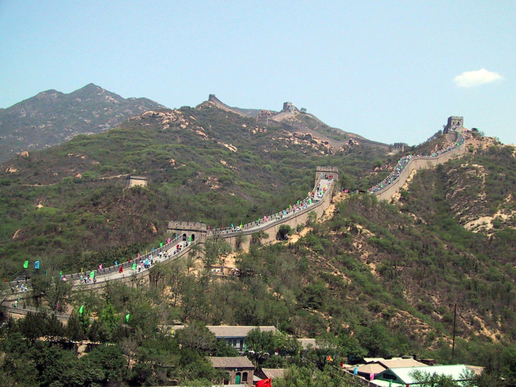 a long expanse of the Great Wall over the mountains