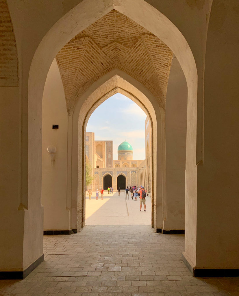 looking through the arches in an Islamic complex