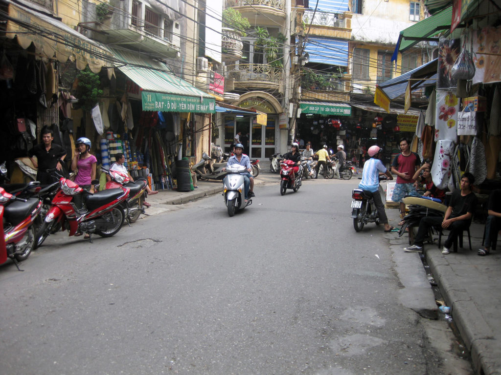 a street in Hanoi with small shops